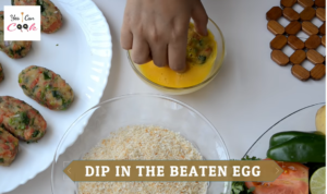 Dipping of Patties in the beaten eggs